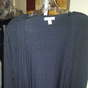 Beautiful blue over throw. Rippled bottom / sleeve